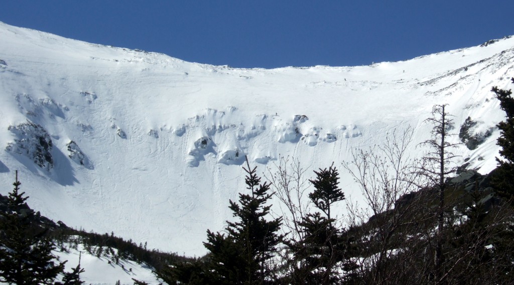 Skiers atop Tuckerman Ravine at Mount Washington. Image taken by Steve Bennett