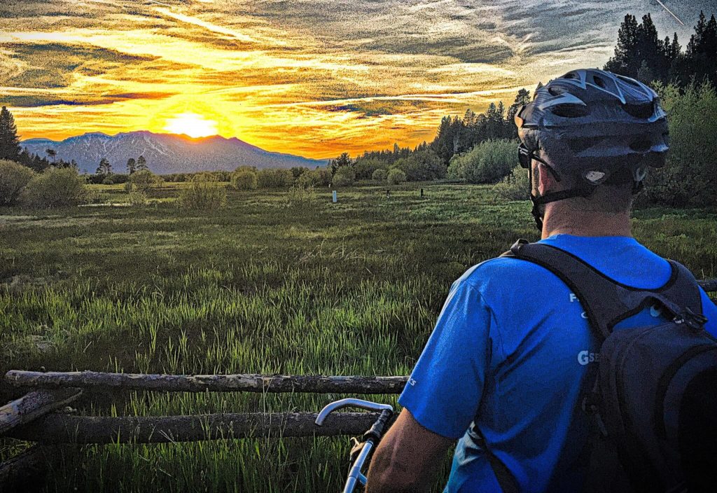 Person looking into Lake Tahoe Meadow after following basic bike maintenance checklist