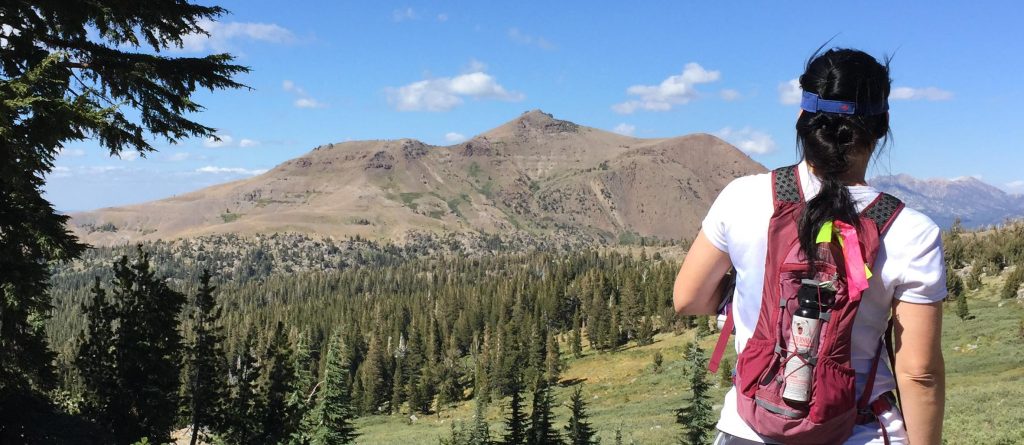 Woman overlooking Carson Pass and contemplating on how to start trail running