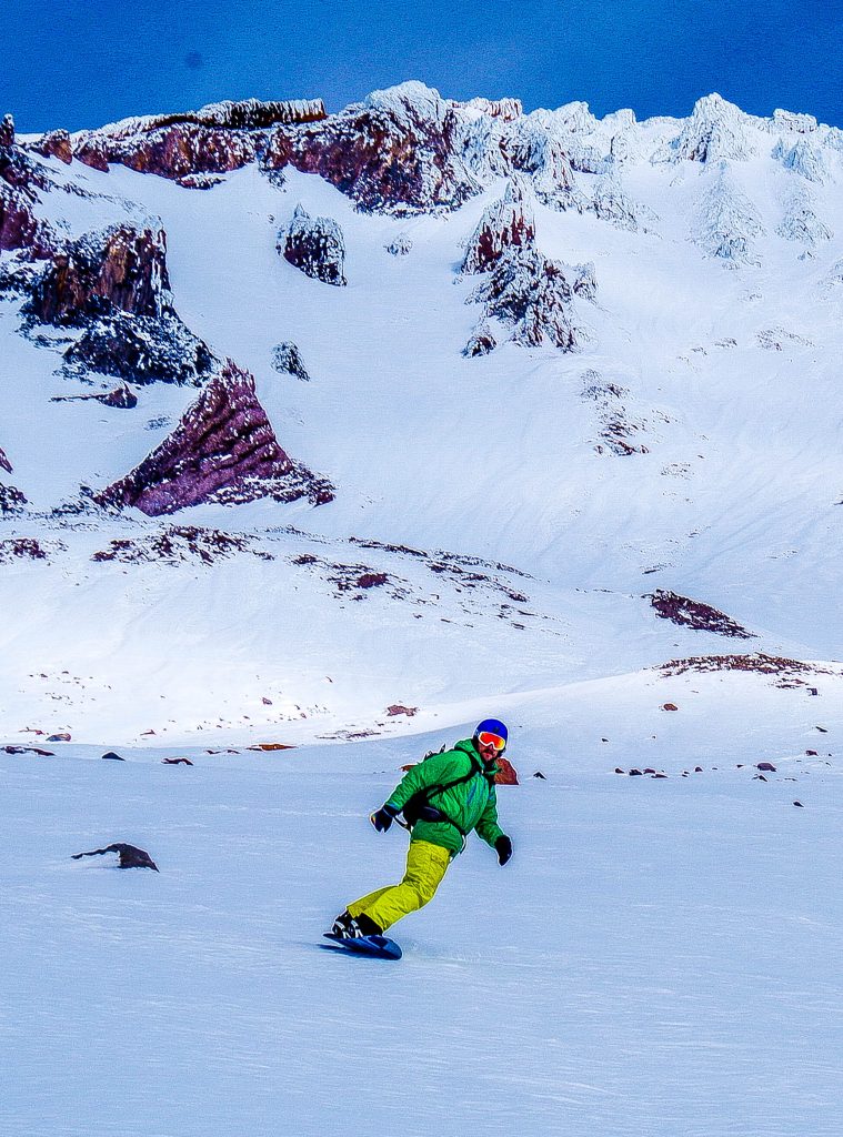 Shane Ricketts eating his cake by snowboarding down Mt. Shasta Image taken by: Zack Holm