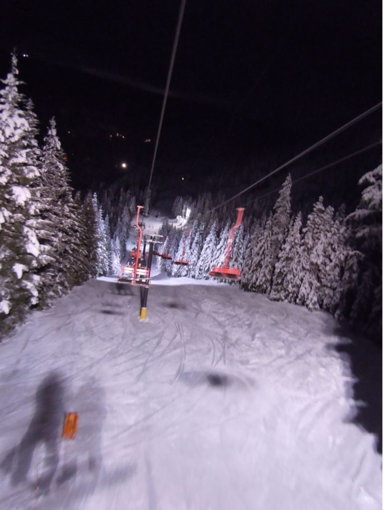 Guide to Mt Hood's Ski Resorts Riding a chairlift at night at Mt Hood Ski Bowl