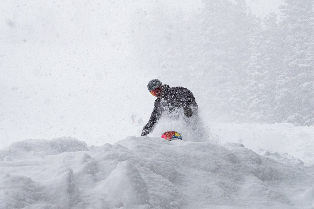 Snowboarder enjoying deep snow at Kirkwood Ski Resort