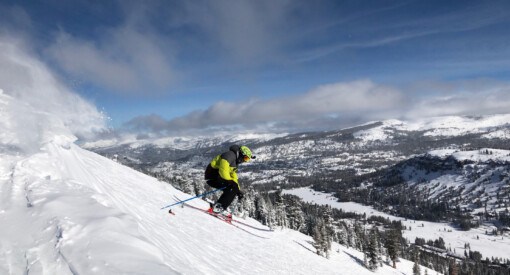 Skier jumping off cornice at Kirkwood Mountain Resort