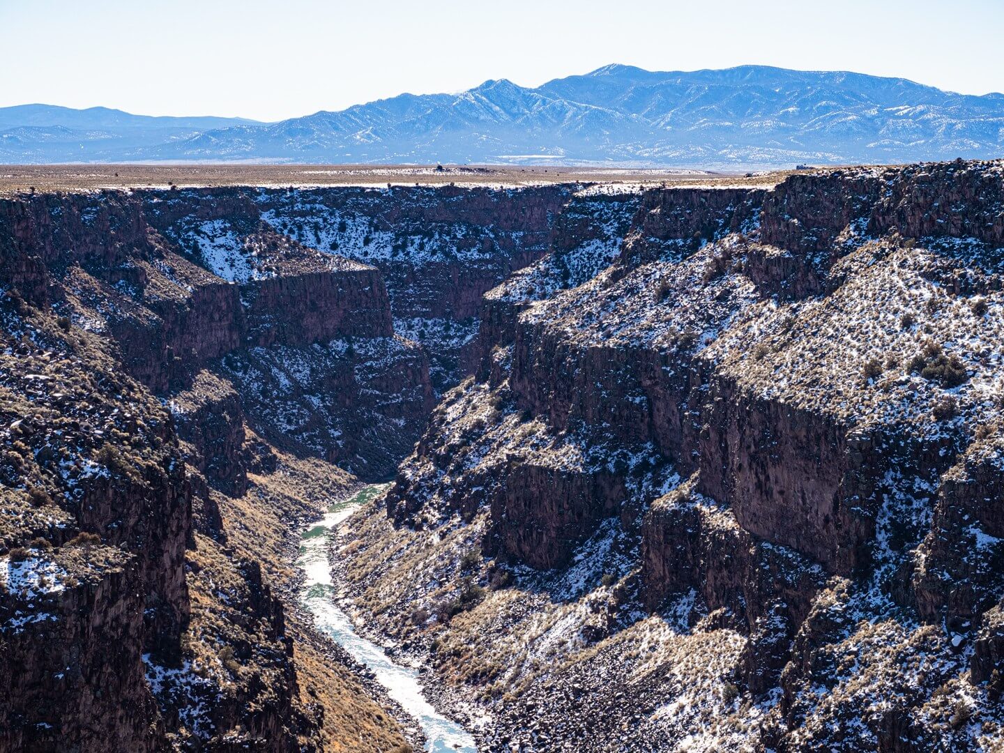 View from Rio Grande Gorge bridge during winter one of the best things to do in Taos NM