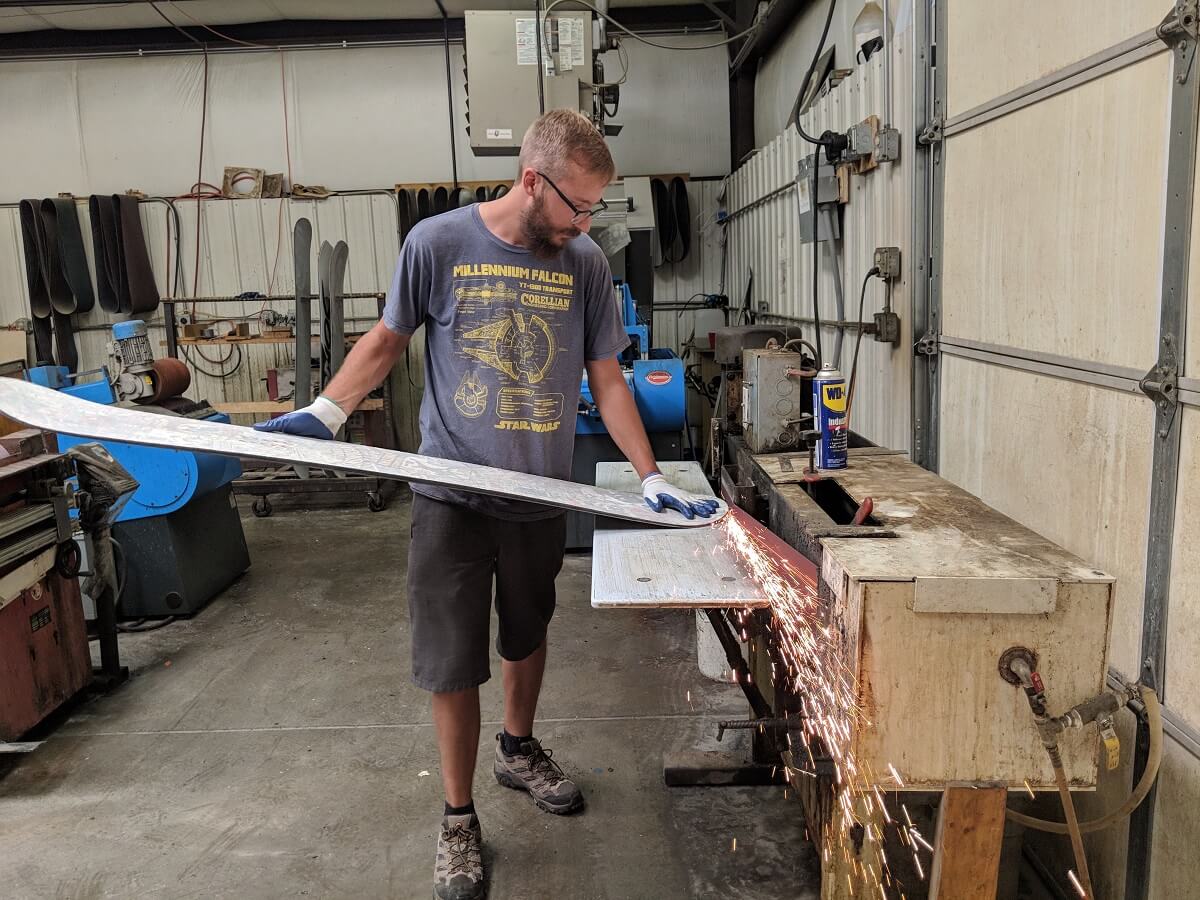 Manufacturer at Donek making a snowboard made in the US. One of the many snowboard brands that has decided to build it state-side.