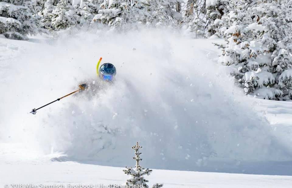 powder skier with snorkel at Brian Head Ski Area To Avoid Overtourism and crowds