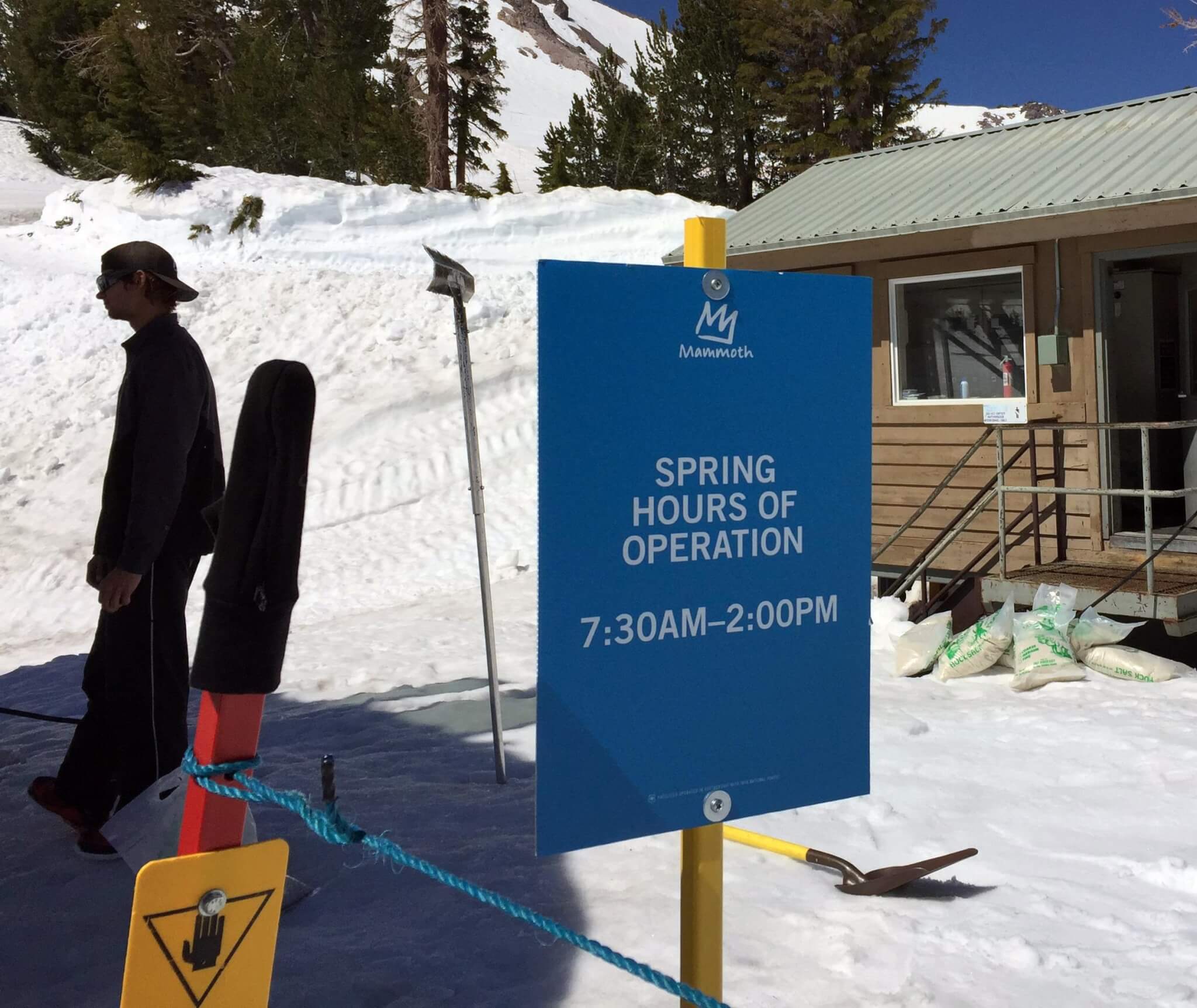 Spring hours of operation sign at Mammoth Mountain