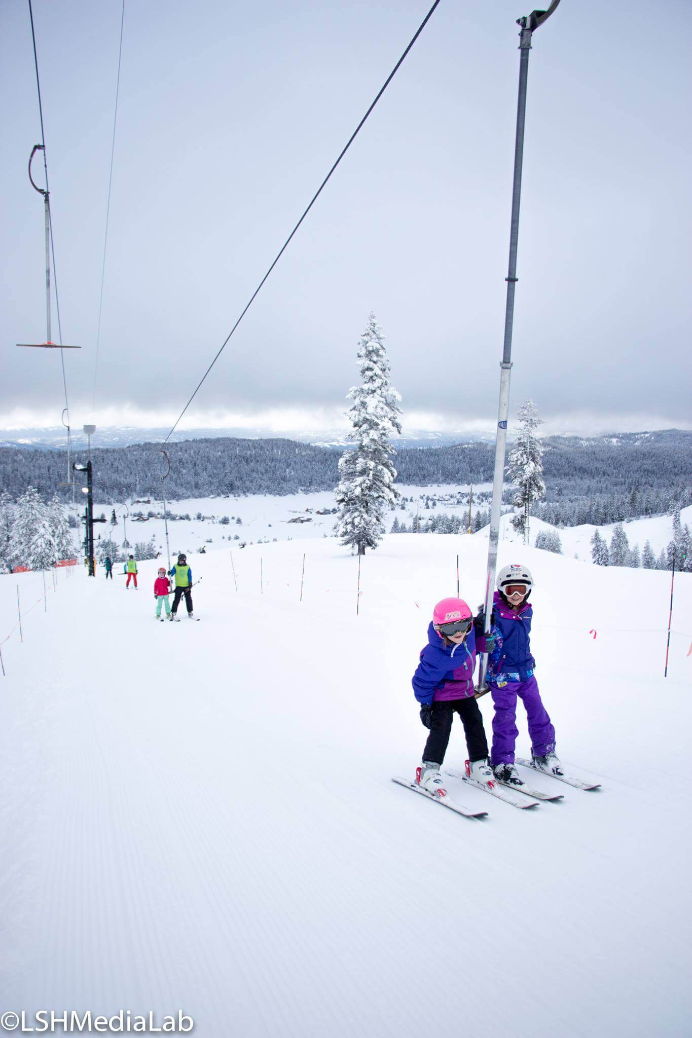 Kids skiing on T-bar at Little Ski Hill in McCall Idaho