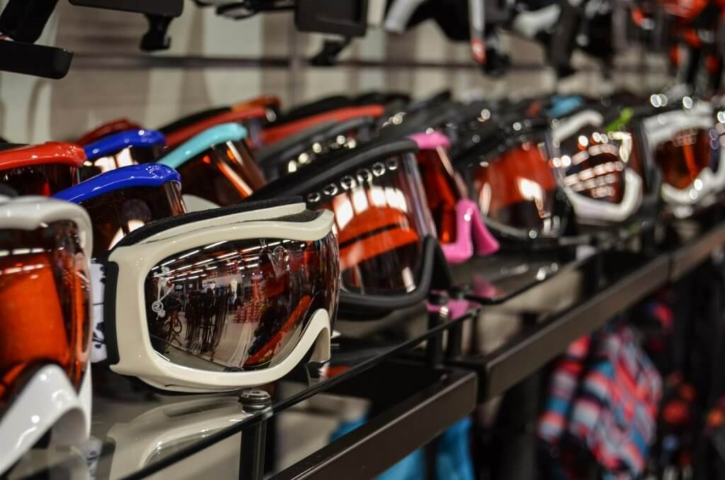 big selection of ski goggles at a shop