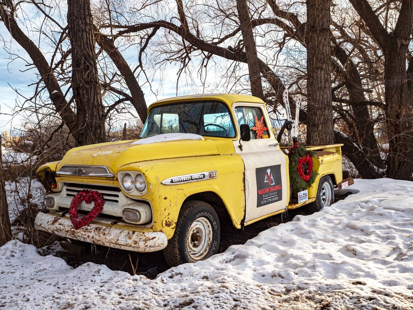 things to do in Taos NM old pickup truck near Arroyo Seco during winter