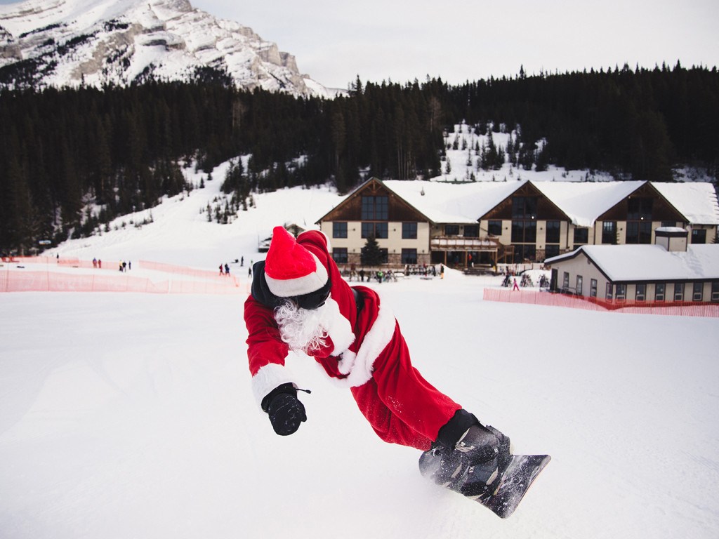 santa snowboarding skiing christmas day