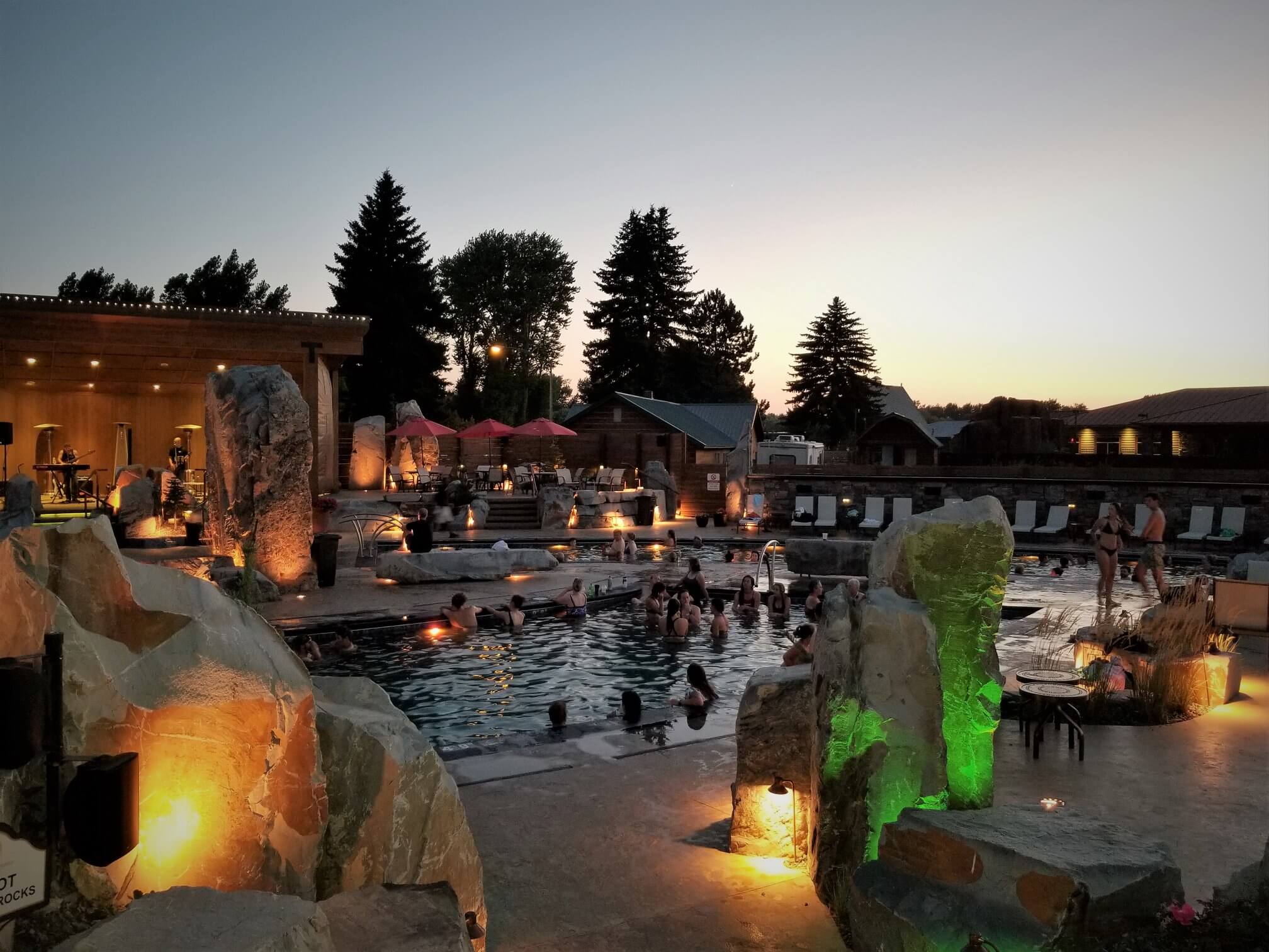 best hot springs resorts in the US - dusk at Bozeman Hot Springs in Montana