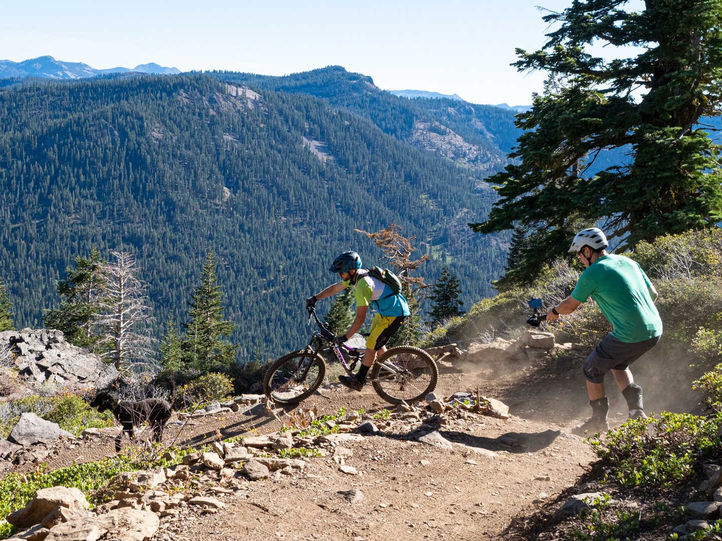 mountain biker enjoying the views off of Stanford Rock near Lake Tahoe