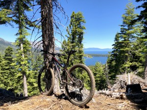 Mountain Bike on top of Angora Ridge overlooking Fallen Leaf Lake and Lake Tahoe in the far distance
