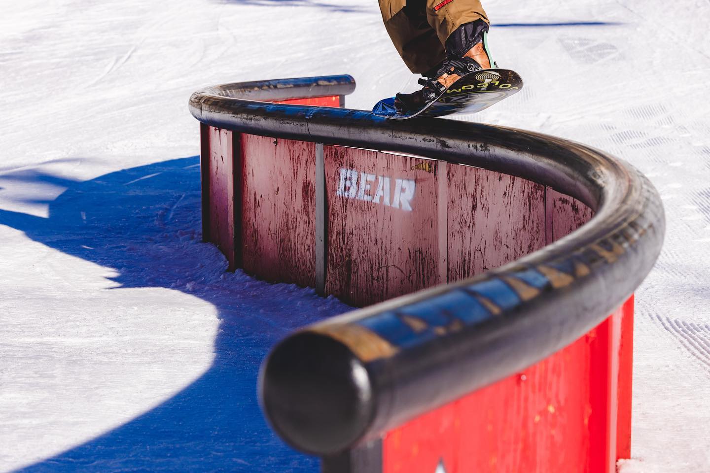 snowboarders doing a nose press at Big Bear