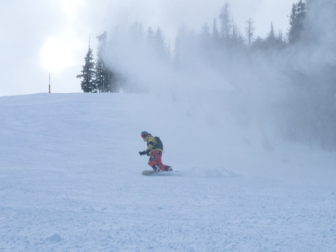 snowboarder riding through snowmaking at Sun Valley Ski Resort