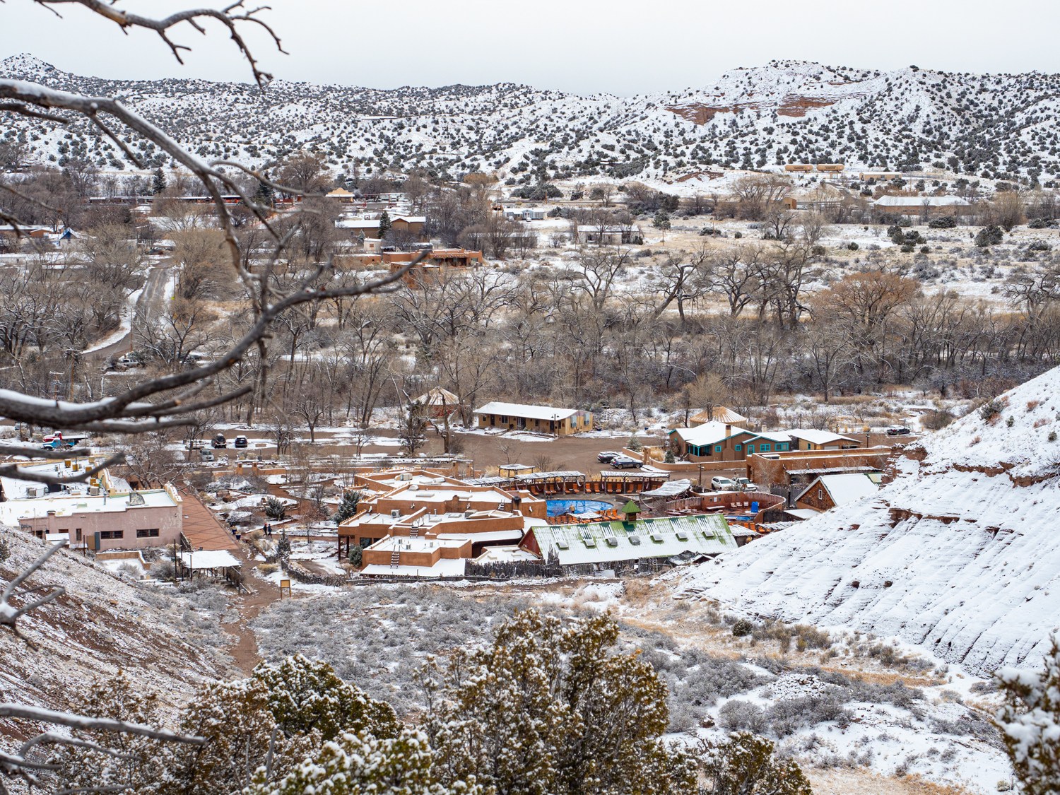 A birdseye view of Ojo Caliente from a mountain top