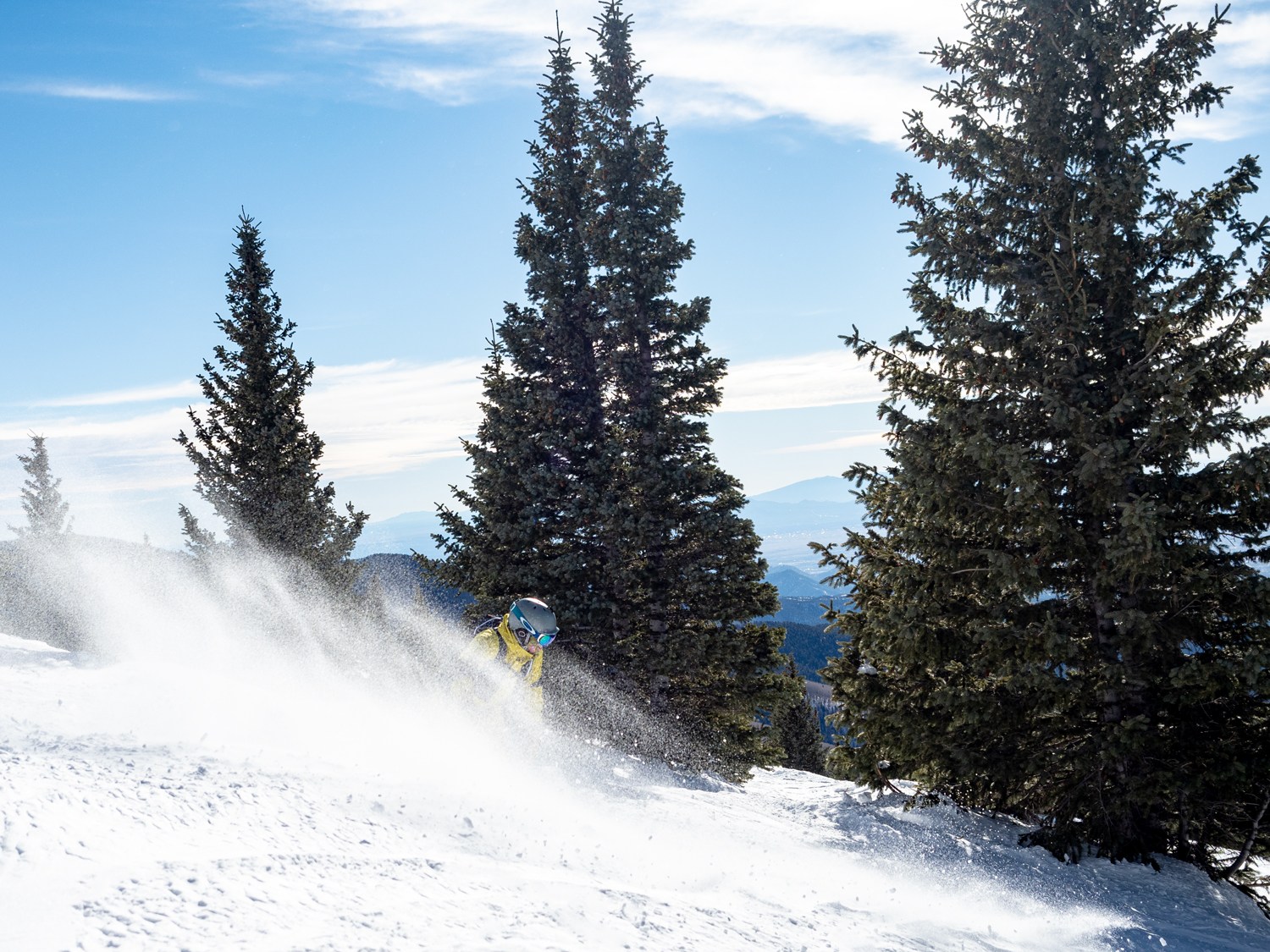 snowboarder enjoying the soft snow at Ski Santa Fe