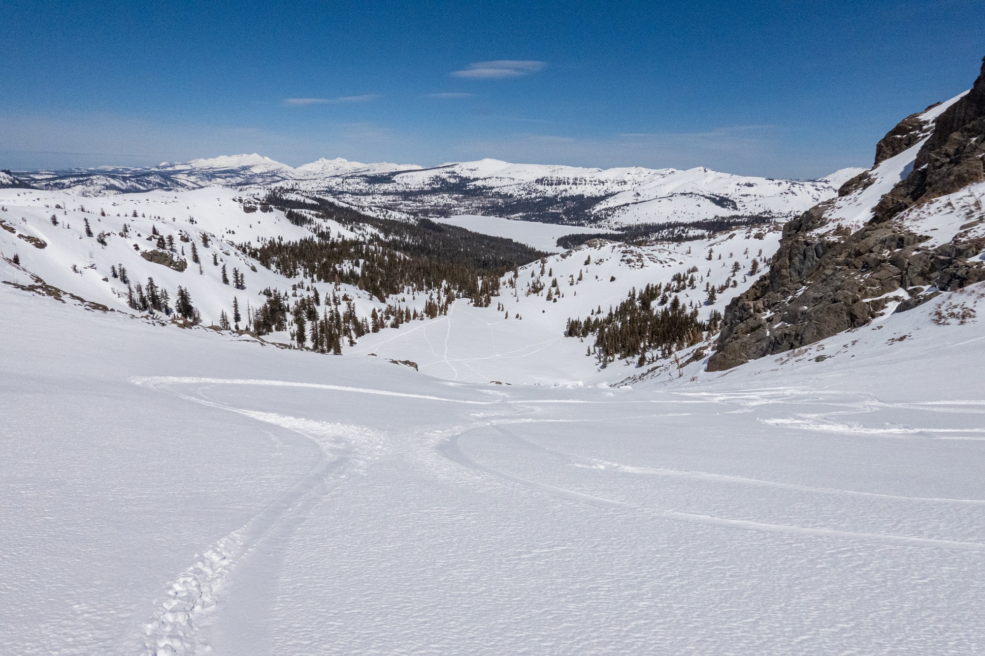 Caples Lake snow covered in the distance looking from Melissa Coray Peak