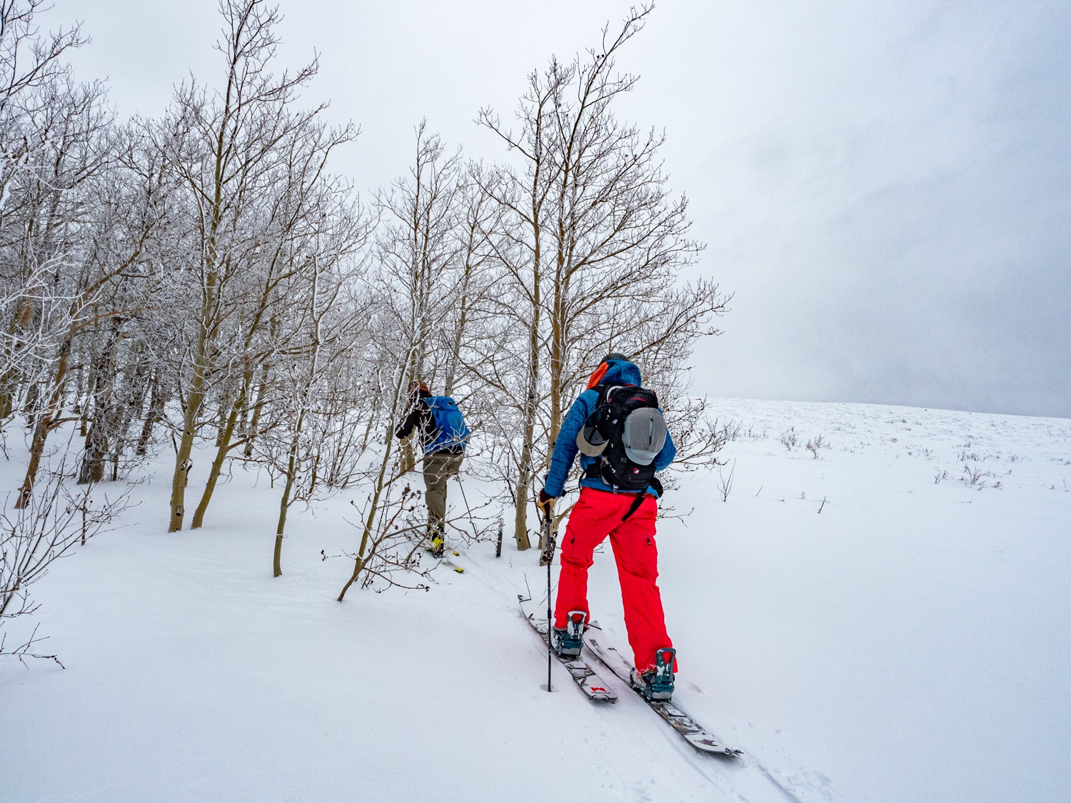 splitboarder skinning up Pomerelle Mountain Resort