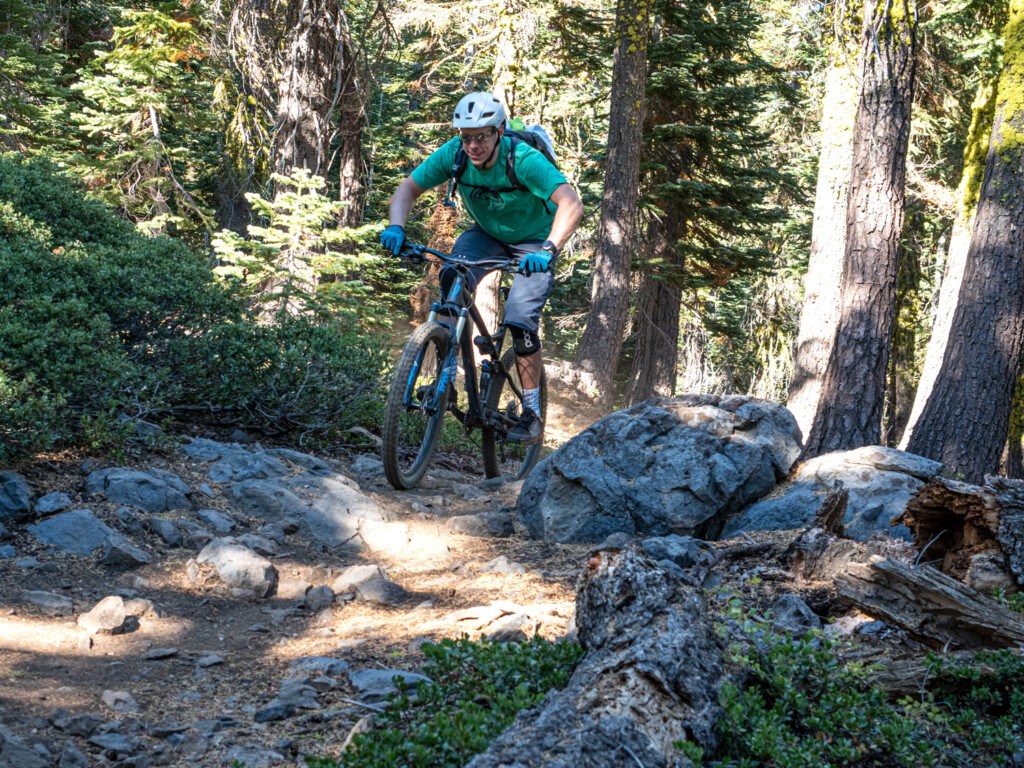 mountain biker wearing Giro DND gloves while riding Stanford Rock trail in Lake Tahoe