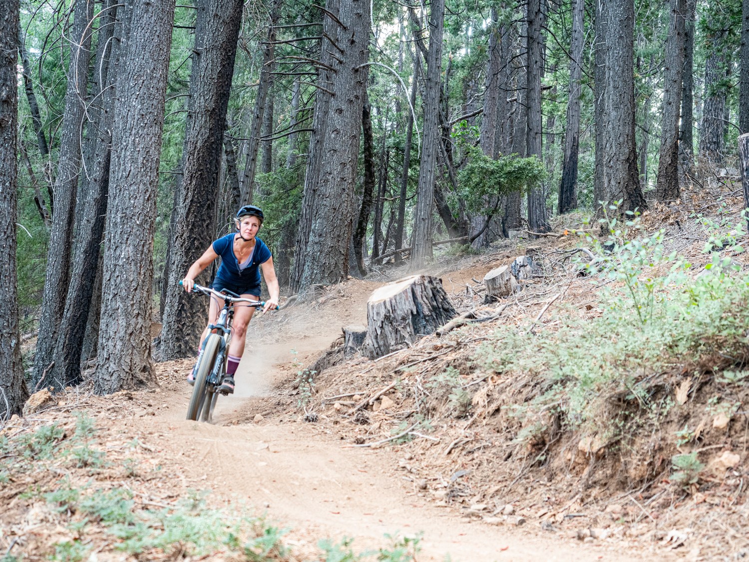 Ariel Lovett riding bike in Nevada City California