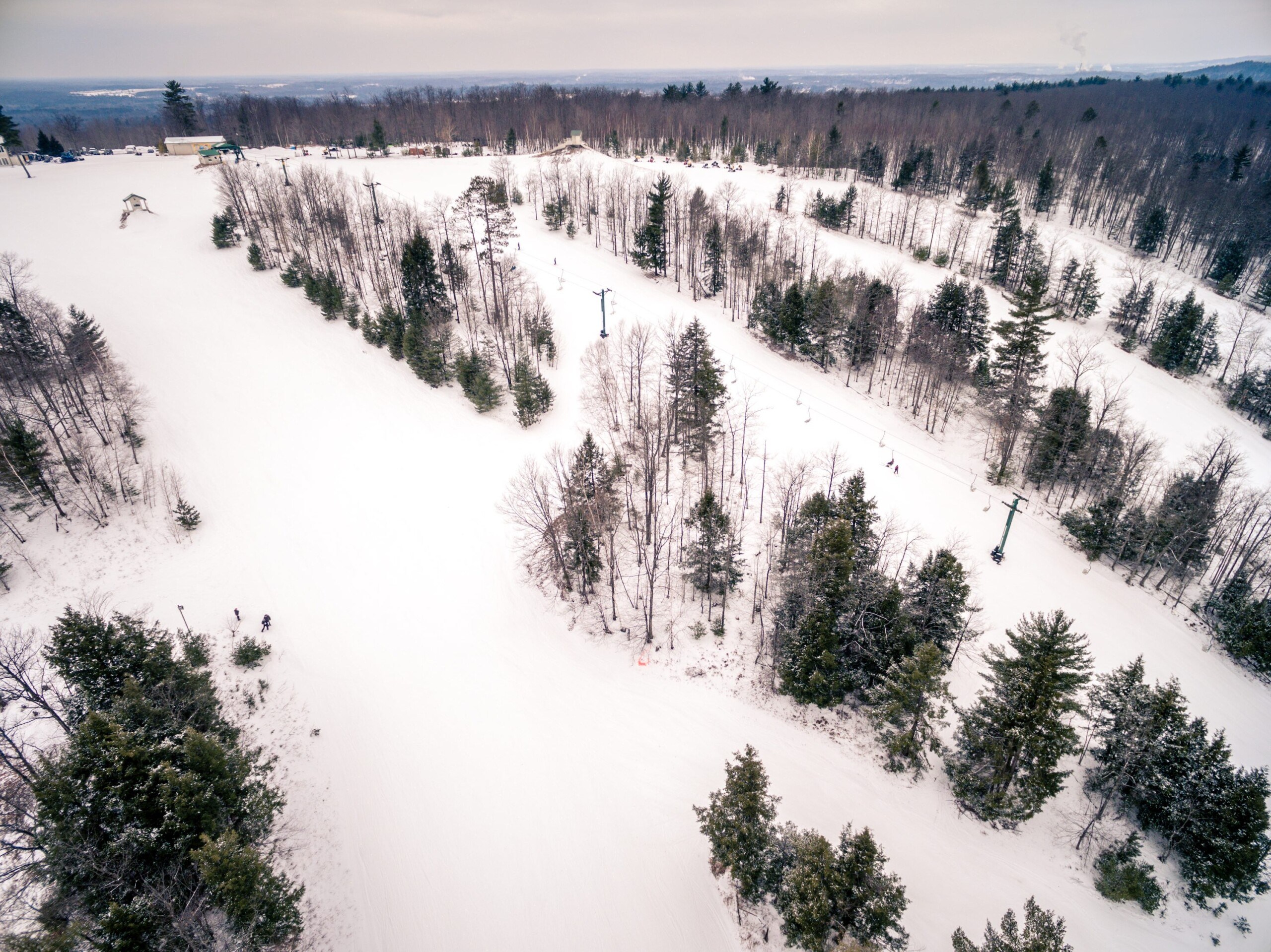 Aerial shot of Norway Mountain Michigan ski area in winter