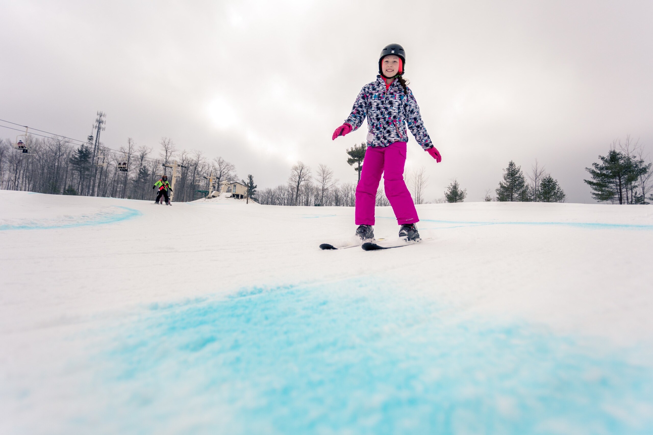 Little girl skiing down slope at Norway Mountain Michigan