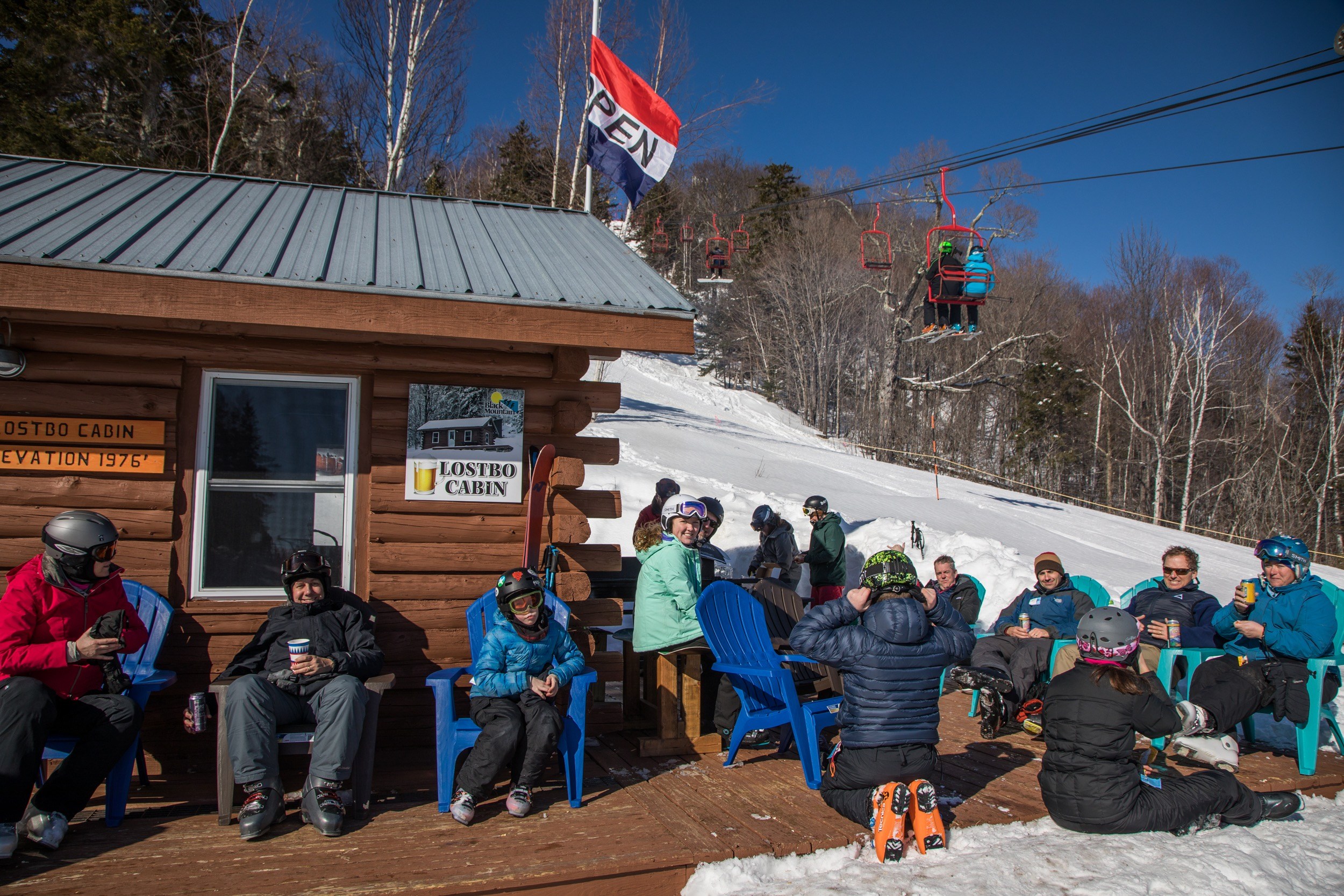 Skiers hanging out at Lostbo Cabin at Black Mountain Ski Area