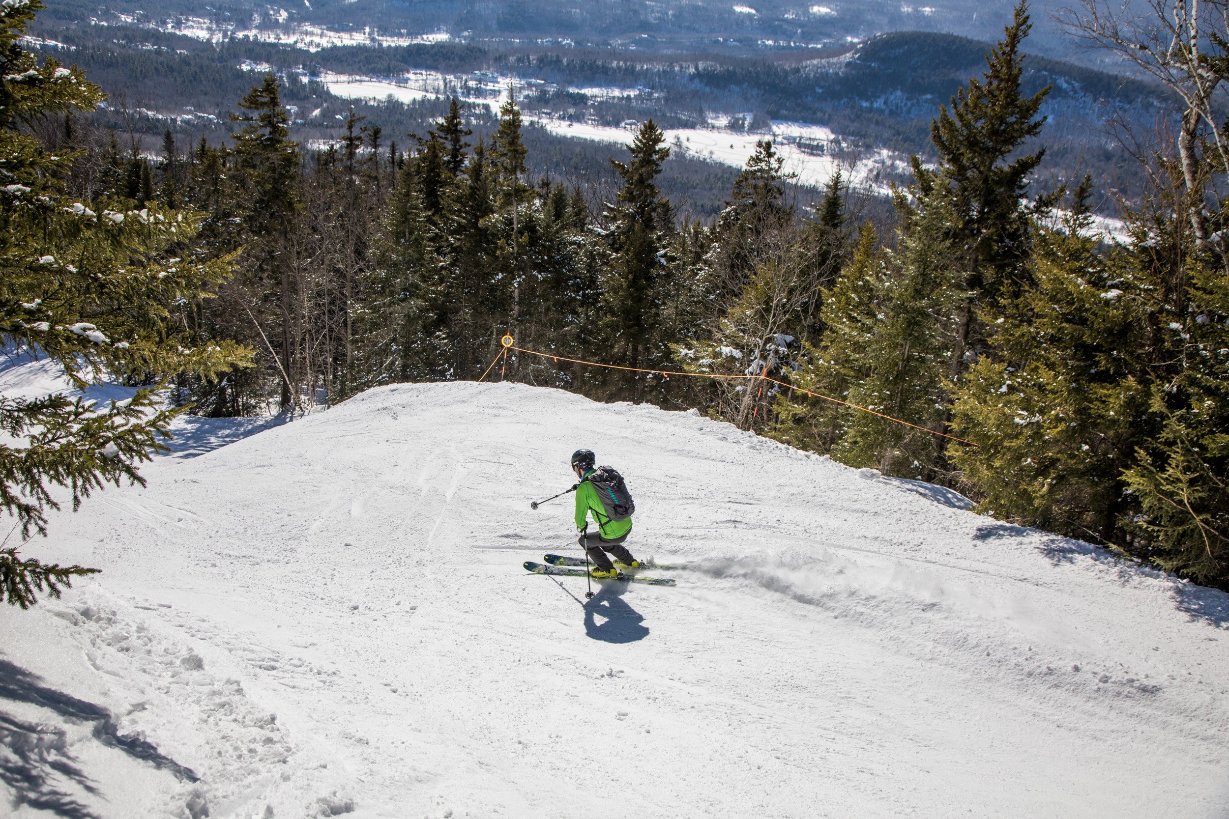 Skier enjoying snow at Black Mountain Ski Area