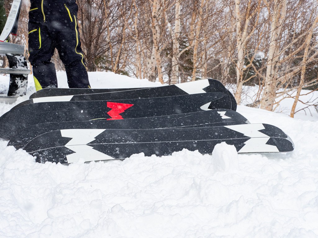 Weston snowboards in Japan on a powder day