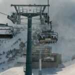 Mammoth Mountain in late November 2024 skiers braving the windy conditions