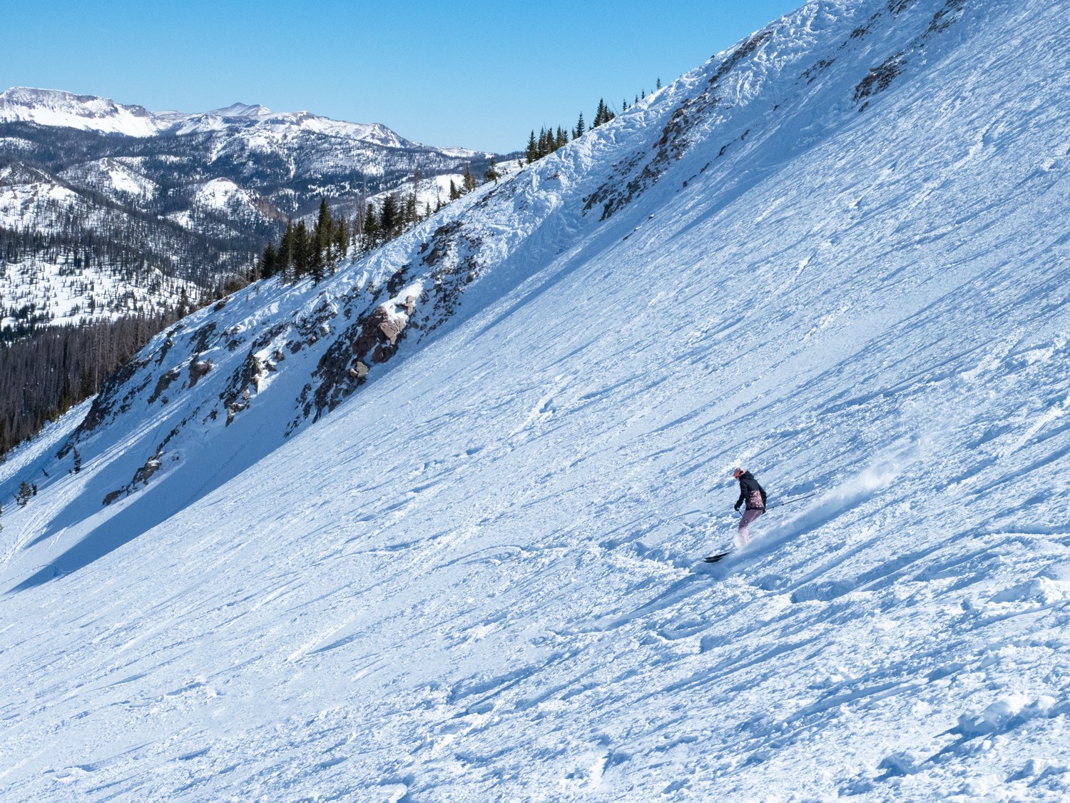 Erika Pitcher making turns down Montezuma Bowl at Wolf Creek Ski Area