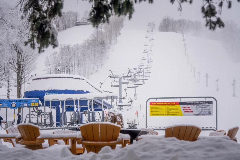 Mountain Express chairlift at Boyne Mountain in heavy lake effect snow