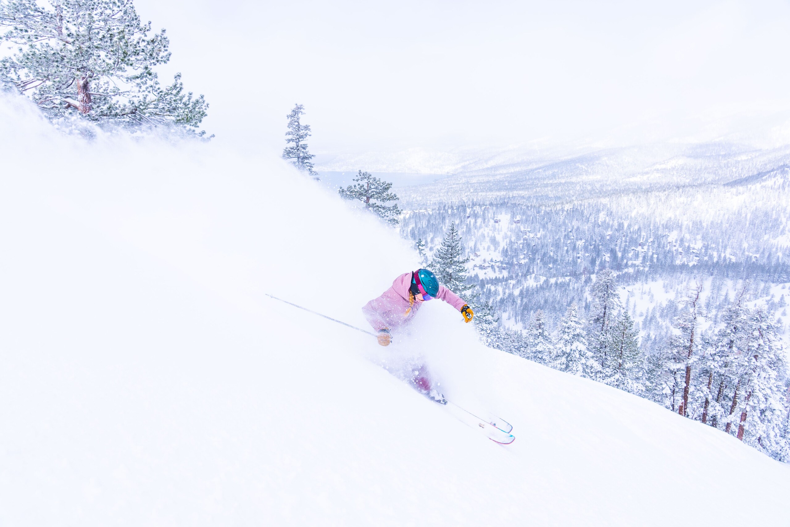 female skier enjoying deep cold snow at Diamond Peak in Lake Tahoe