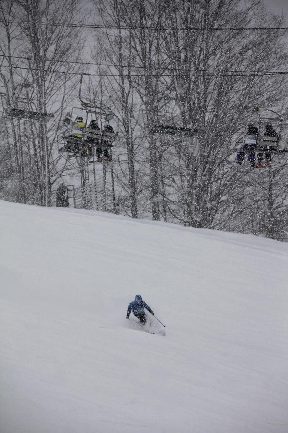 Skier enjoying the powder at Crystal Mountain during a storm day