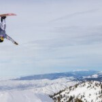 snowboarder doing backflip at Bogus Basin Resort