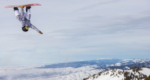 snowboarder doing backflip at Bogus Basin Resort