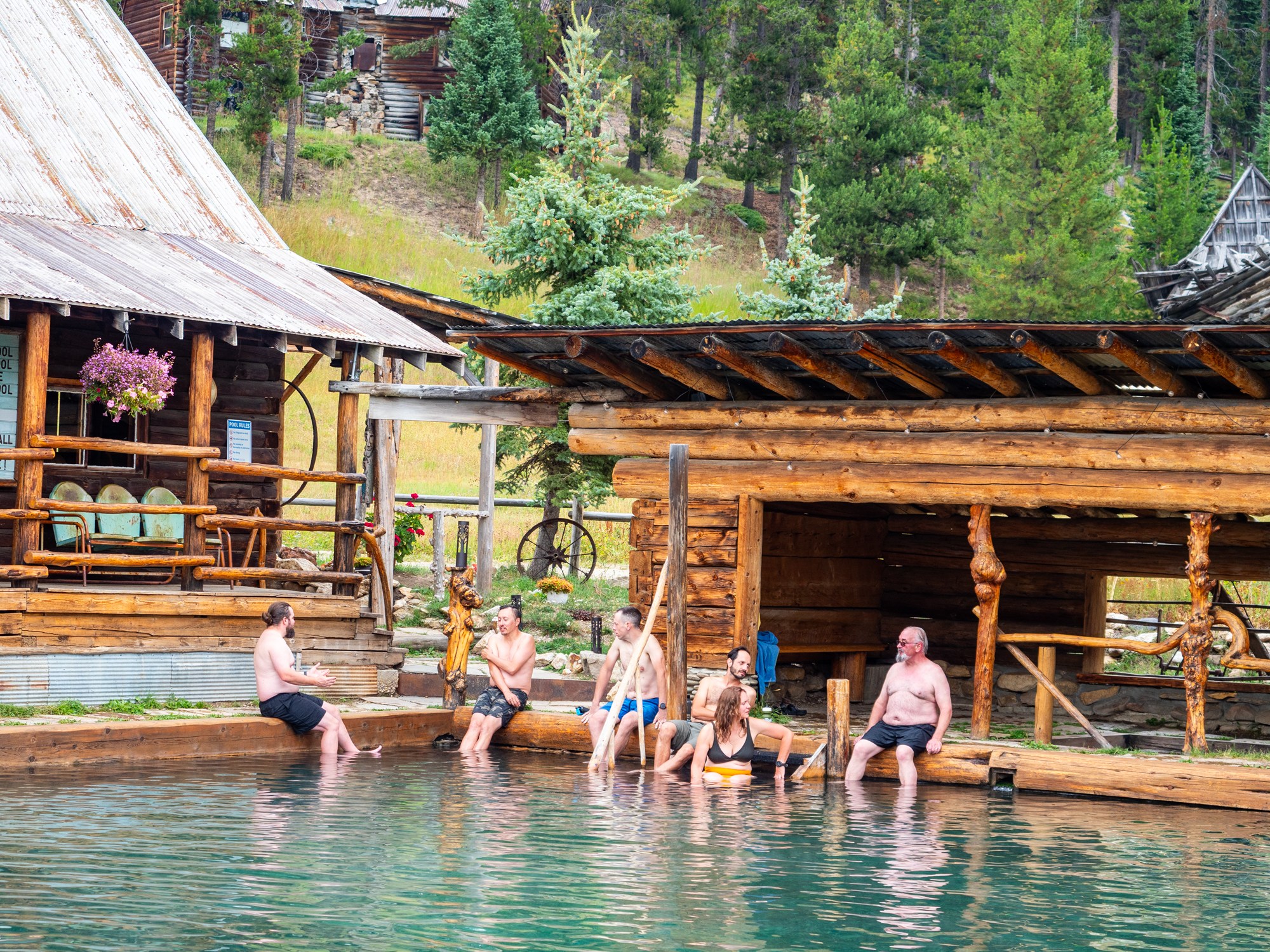 People enjoying Burgdorf Hot Springs after mountain biking at Jug Mountain Ranch