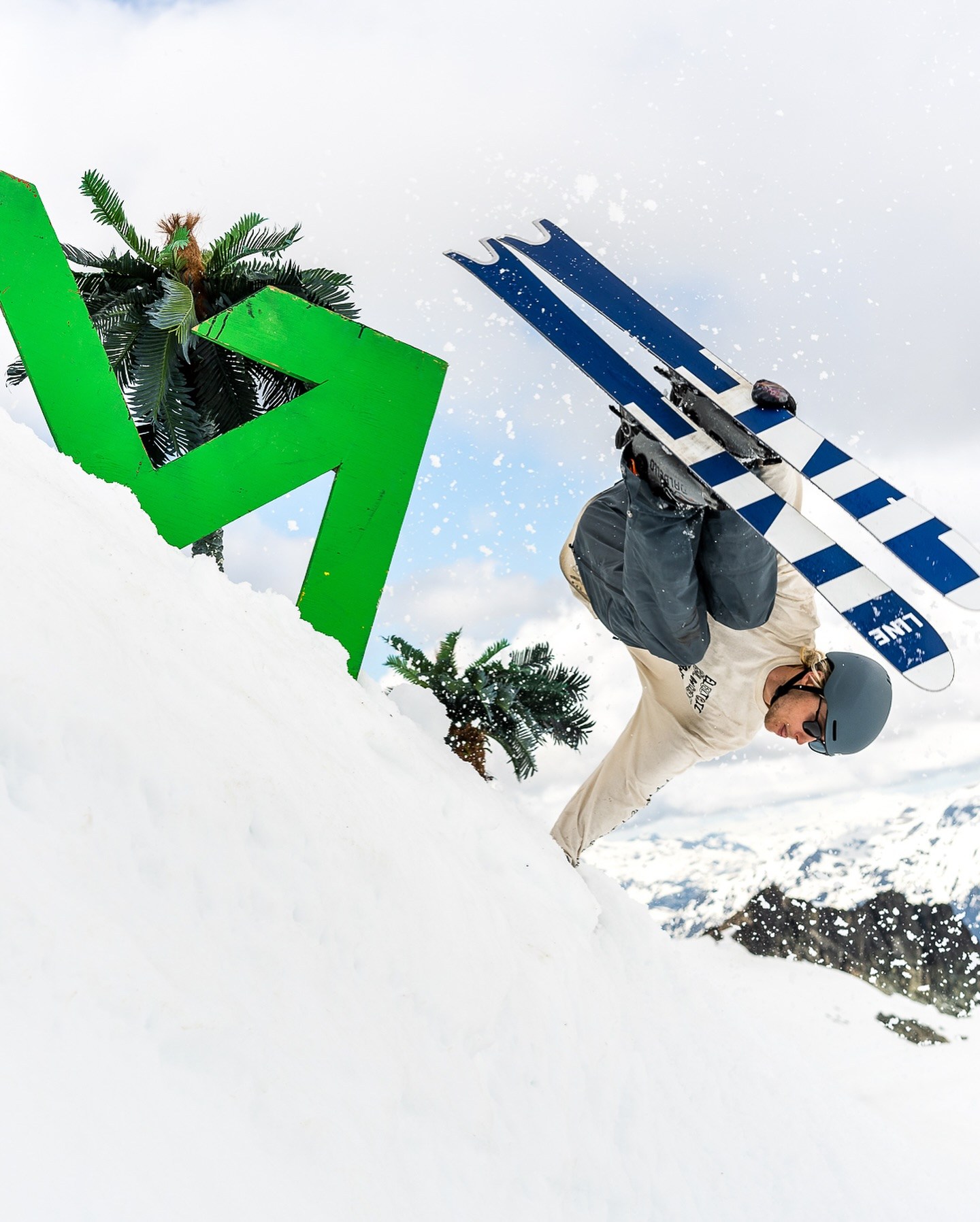 skier tweaking out trick as Momentum Ski Camp at Whistler