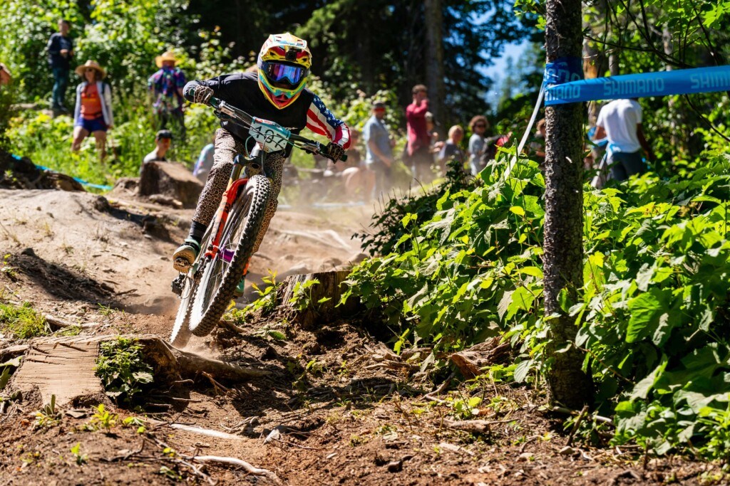 female mountain bike racer dropping down through the exciting course of the NW Cup