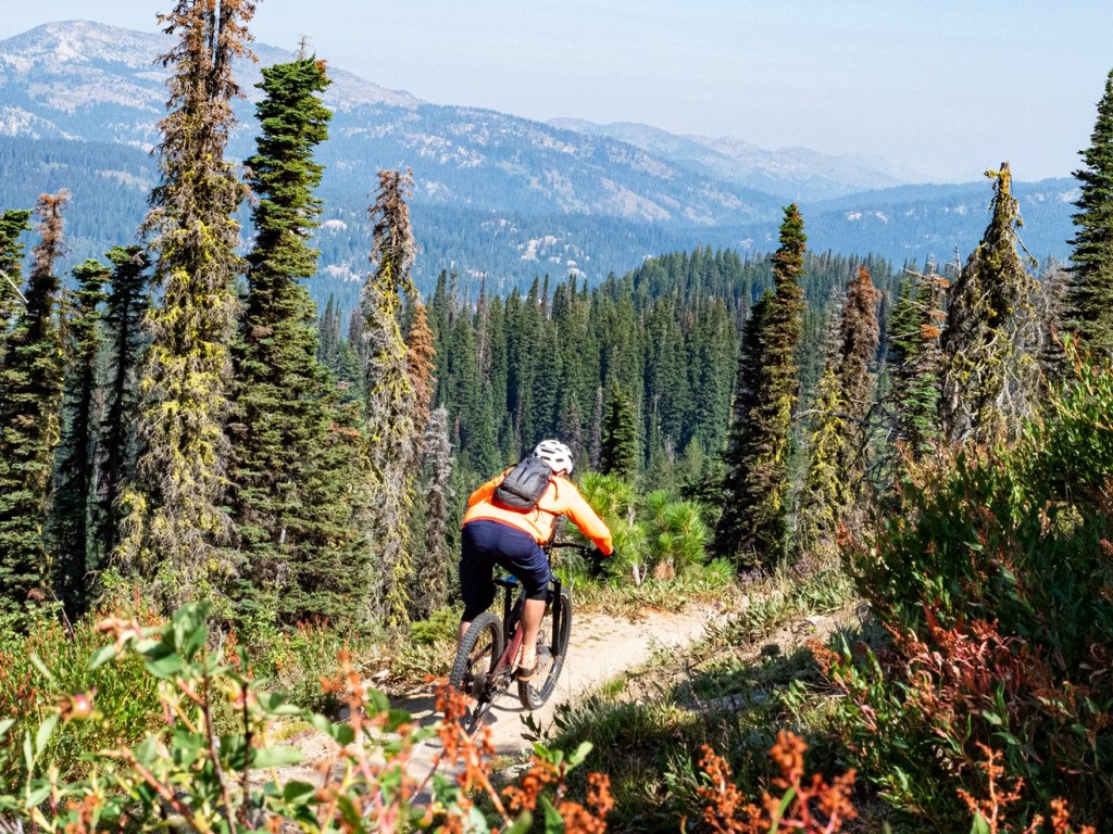 mountain biker riding down Brundage Mountain