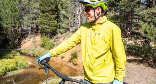 XL Outdoor Research Shadow Wind Hoodie on man that is 6 feet 3 inches tall