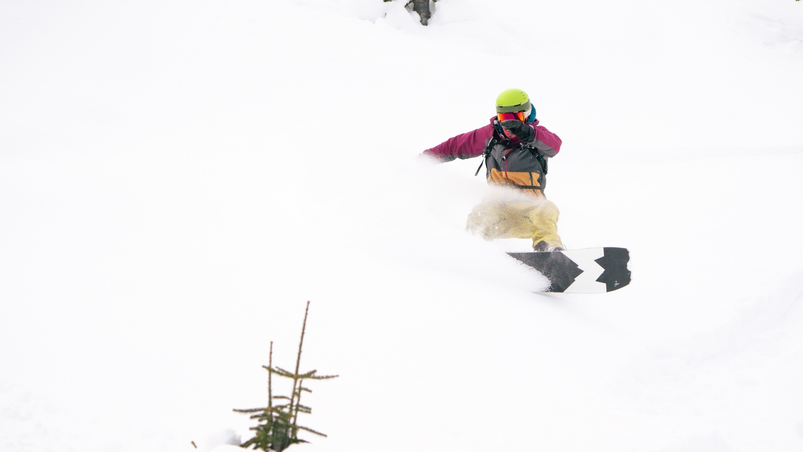 Alex Silgalis slashing the deep pow at White Grizzly