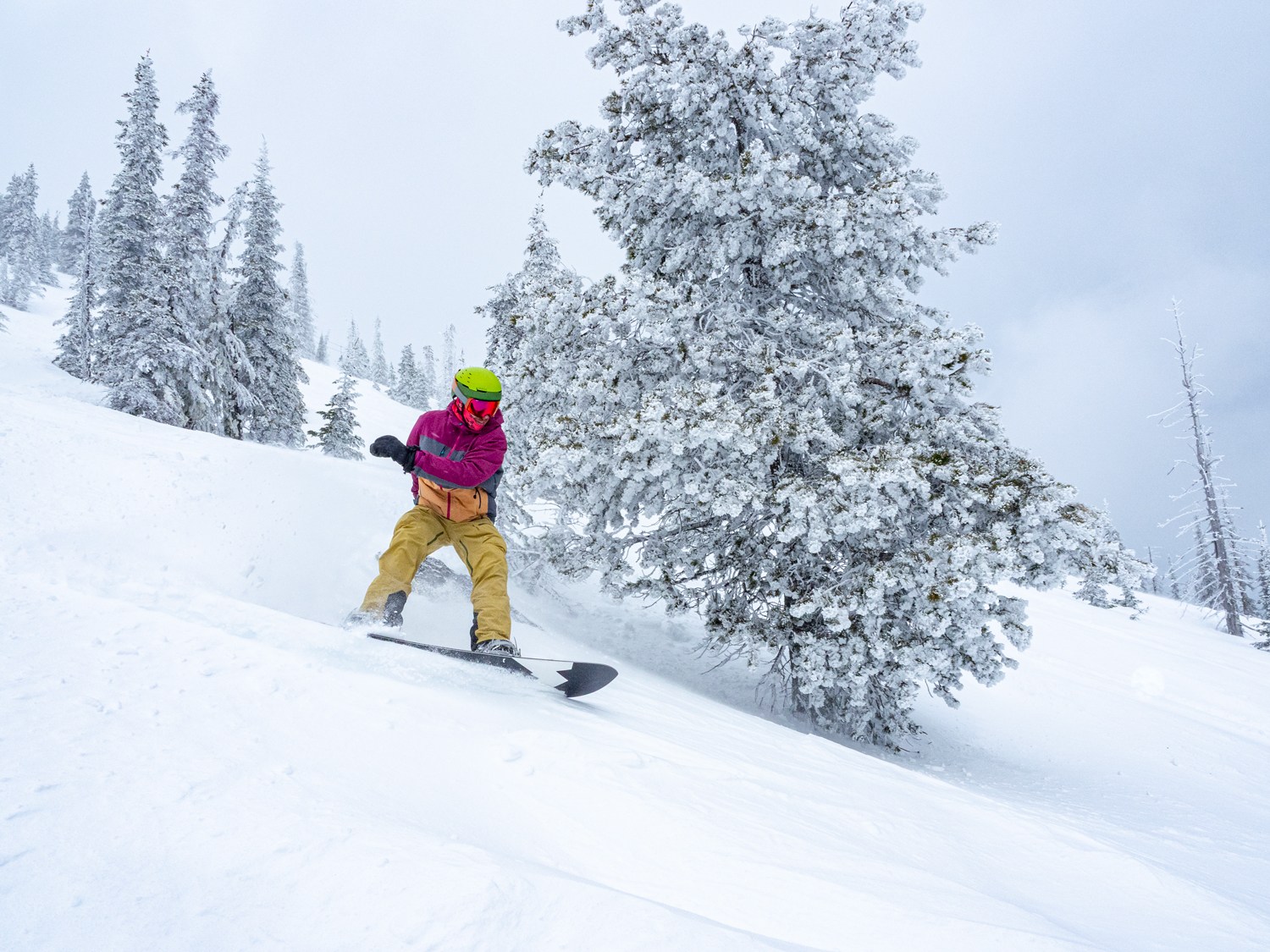 Snowboarding down Grey Mountain at Red Mountain Ski Resort