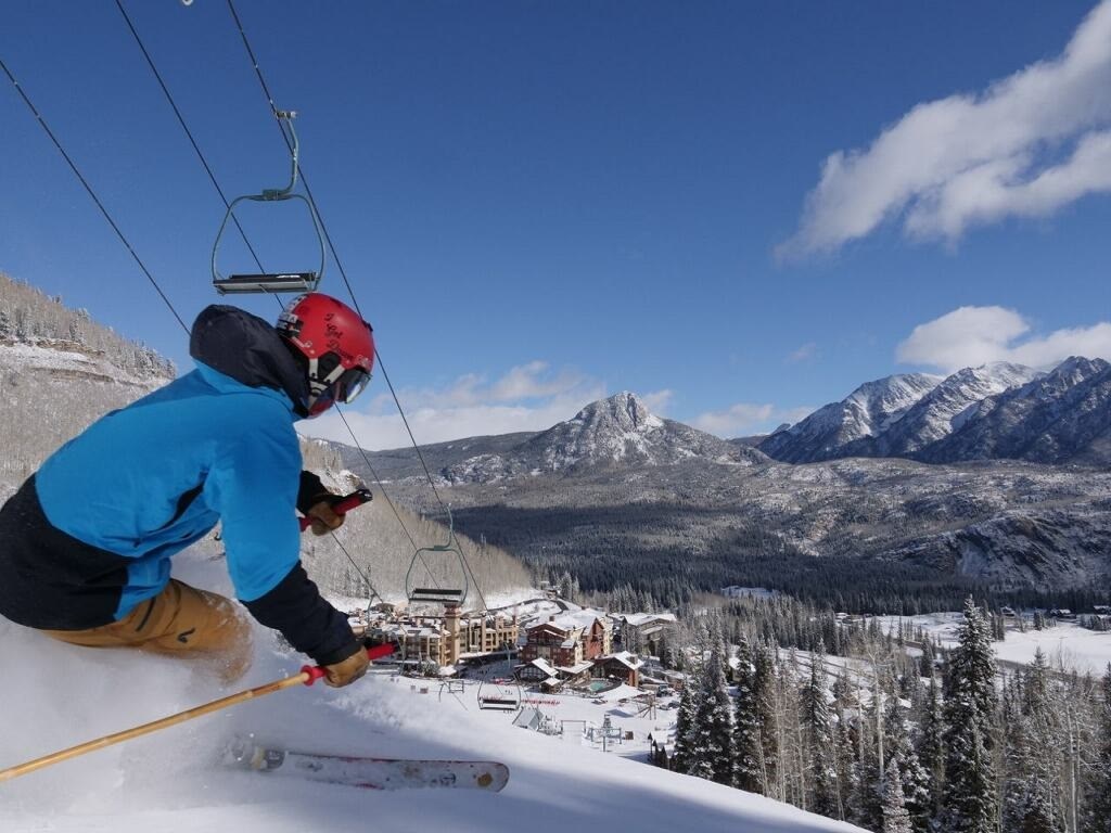 skier enjoying Pandomonium at base of Purgatory Ski Resort
