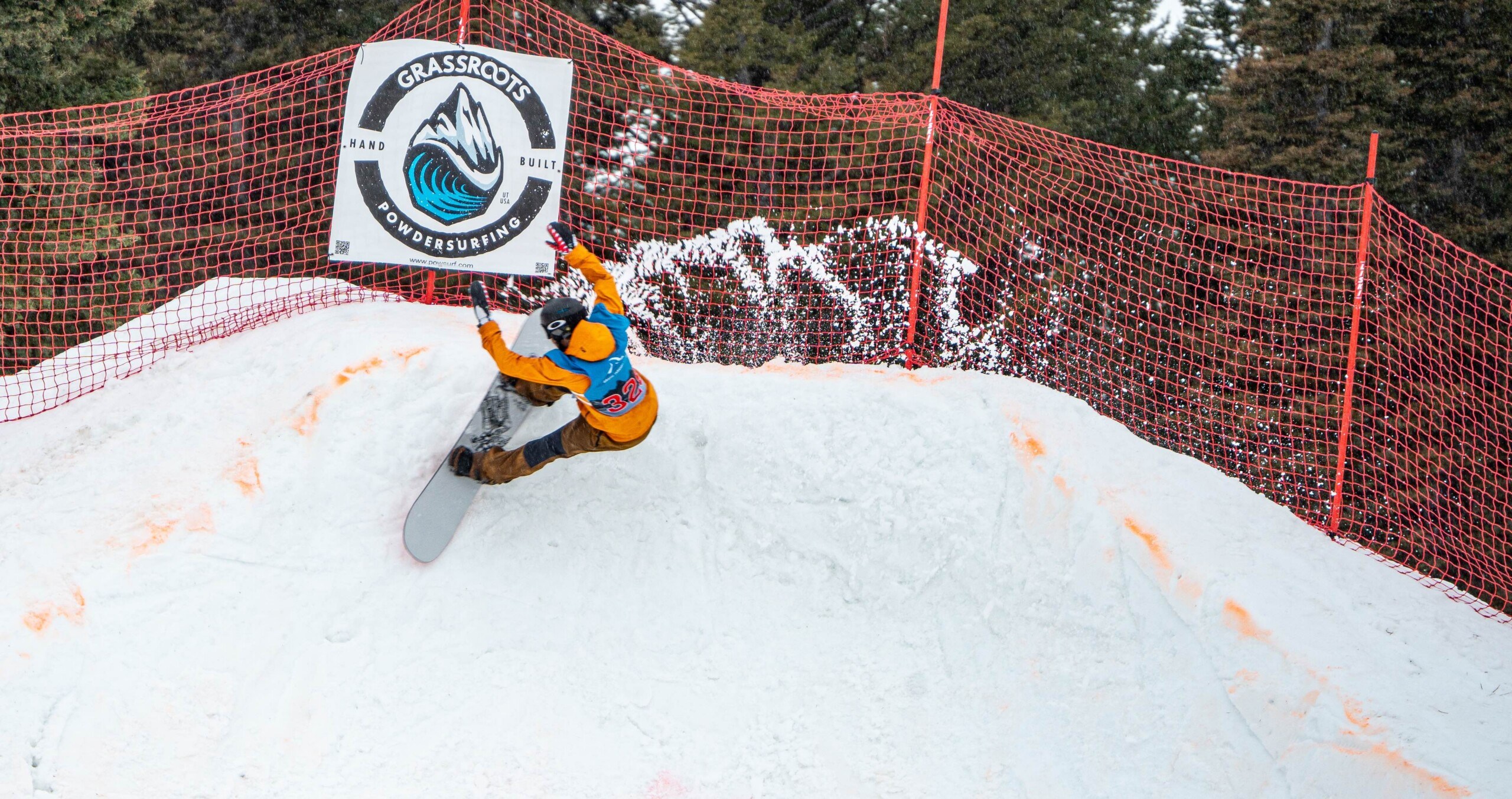 Snowboarder slashing at Teton Surf Classic at Grand Targhee Resort