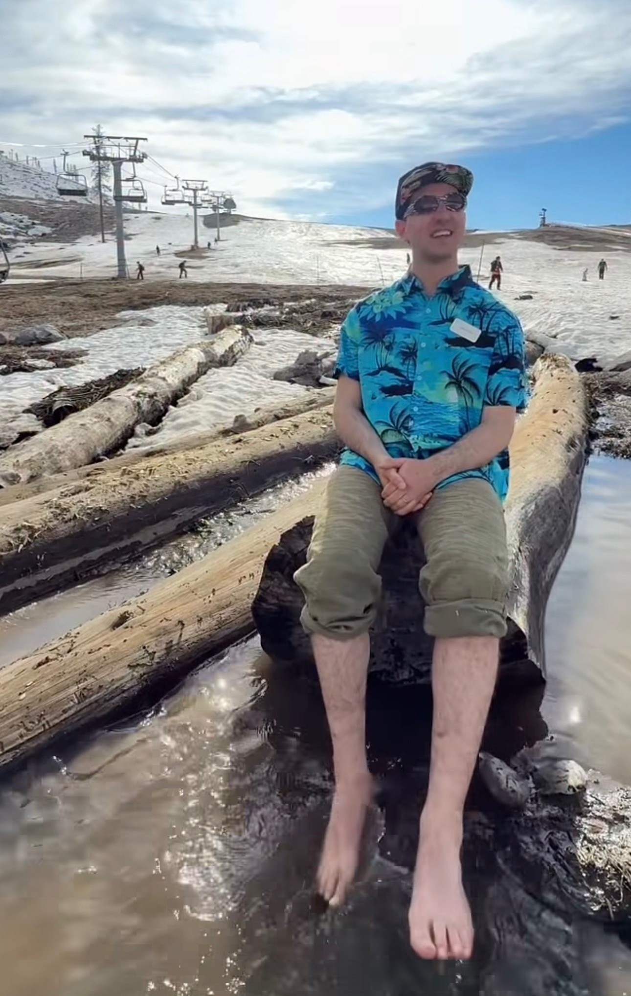 Marketing manager in water at the base of Sierra at Tahoe for closing day