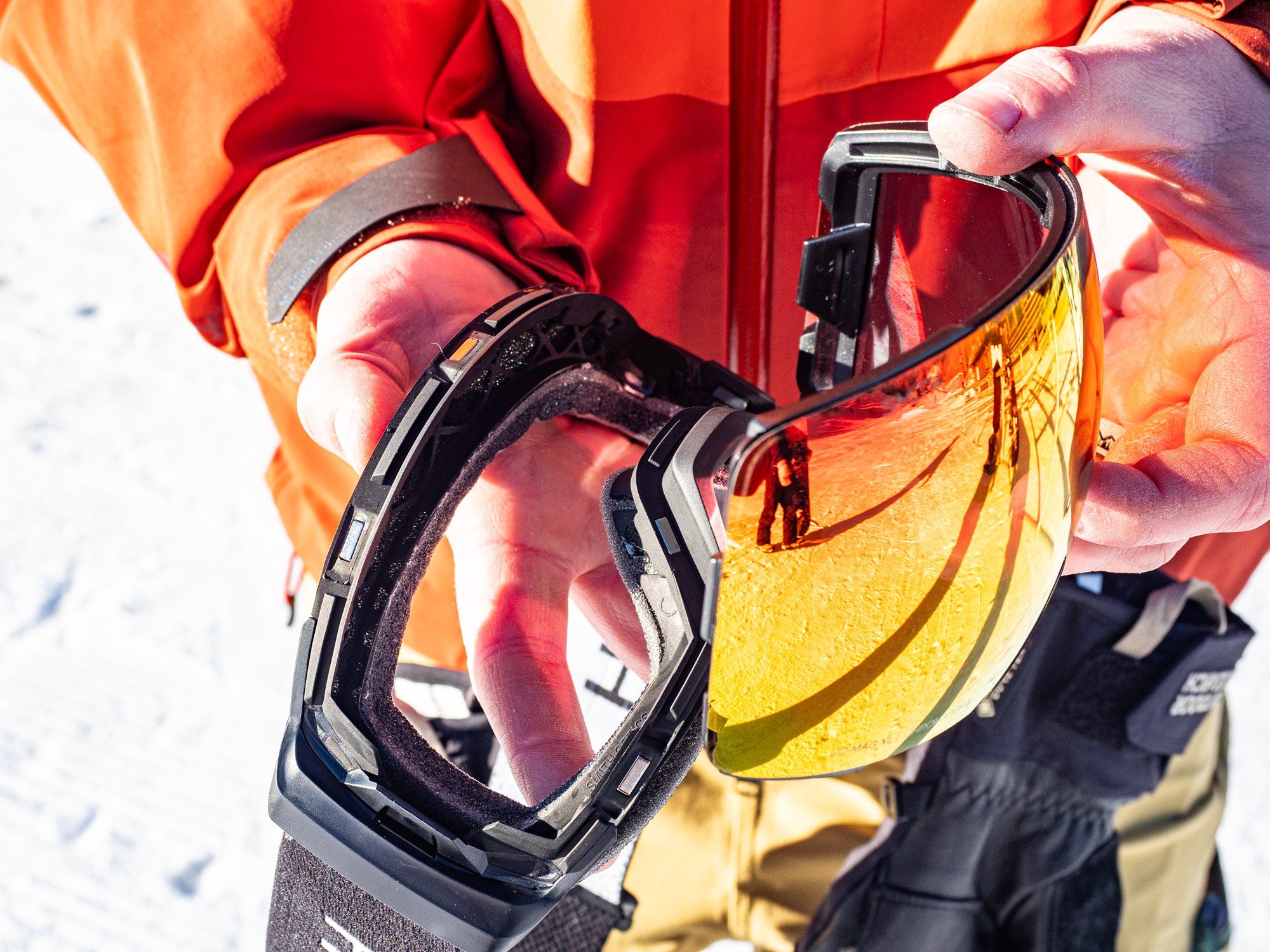Close-up view of replacing a lens on the Smith I/O Goggles