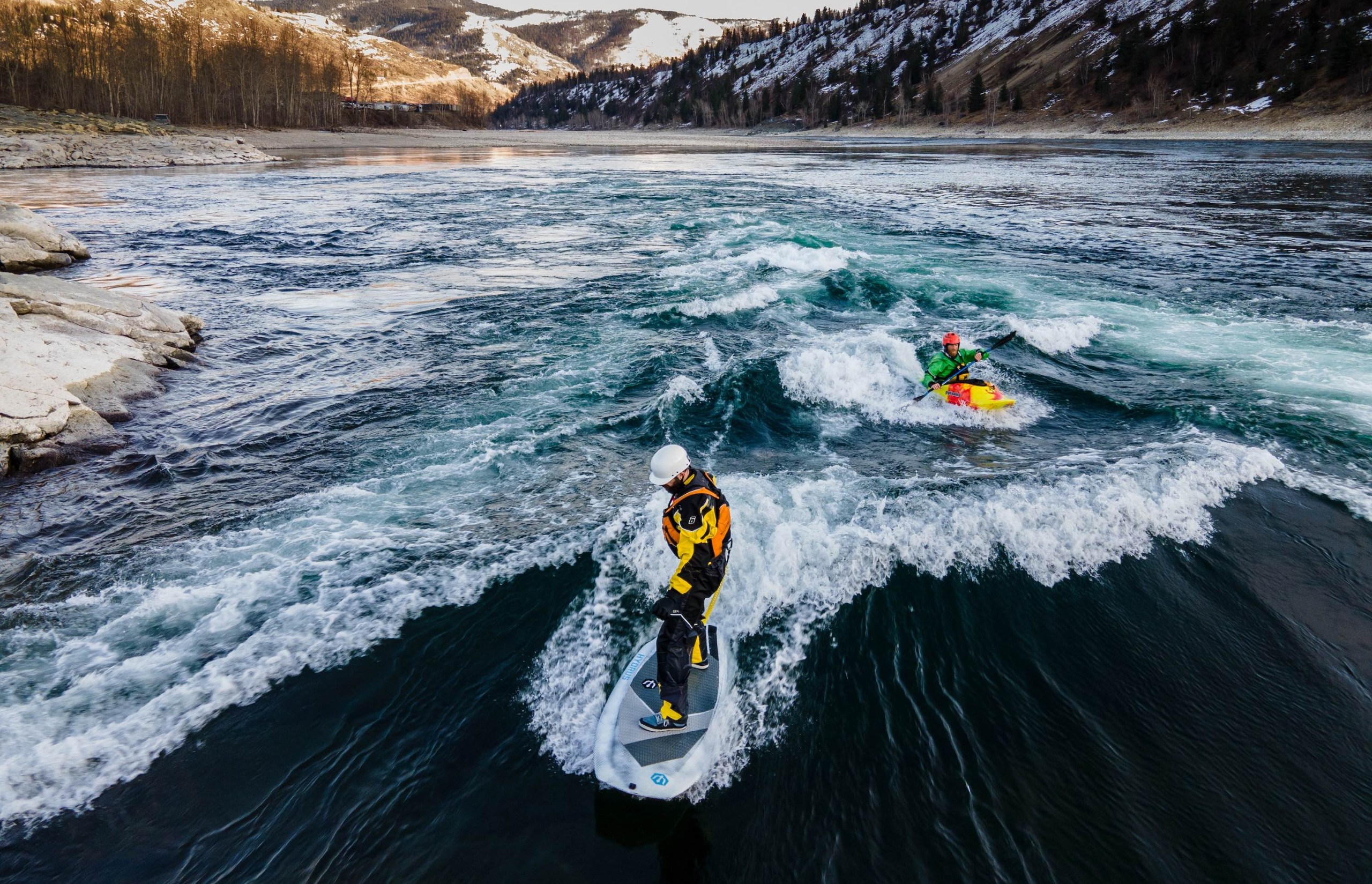 river surfing Industrial Hole in Trail British Columbia in the spring